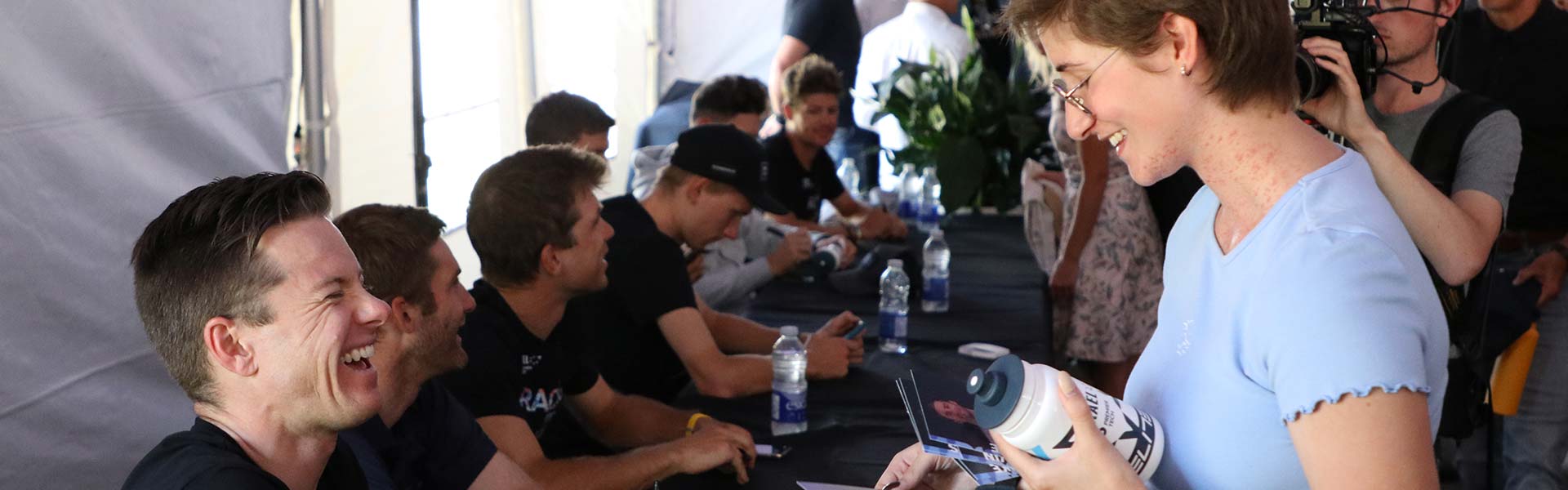 Britany Cauchon getting an autograph from IPT riders