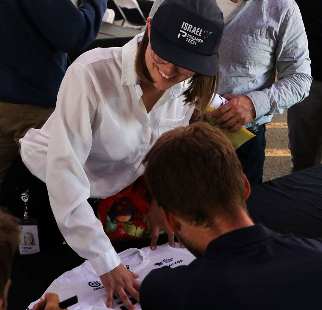 Team member getting an autograph