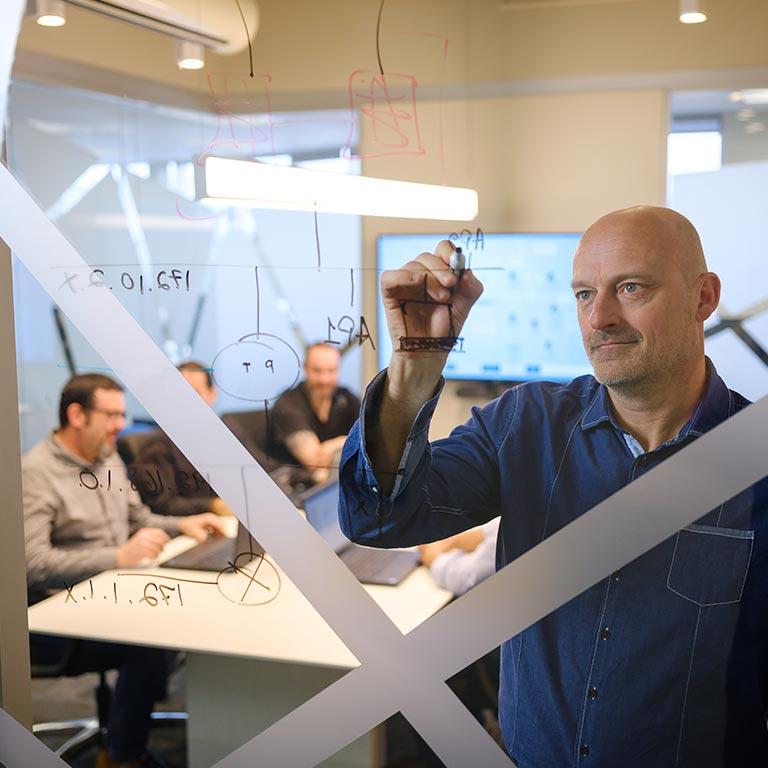 Team member working in a meeting