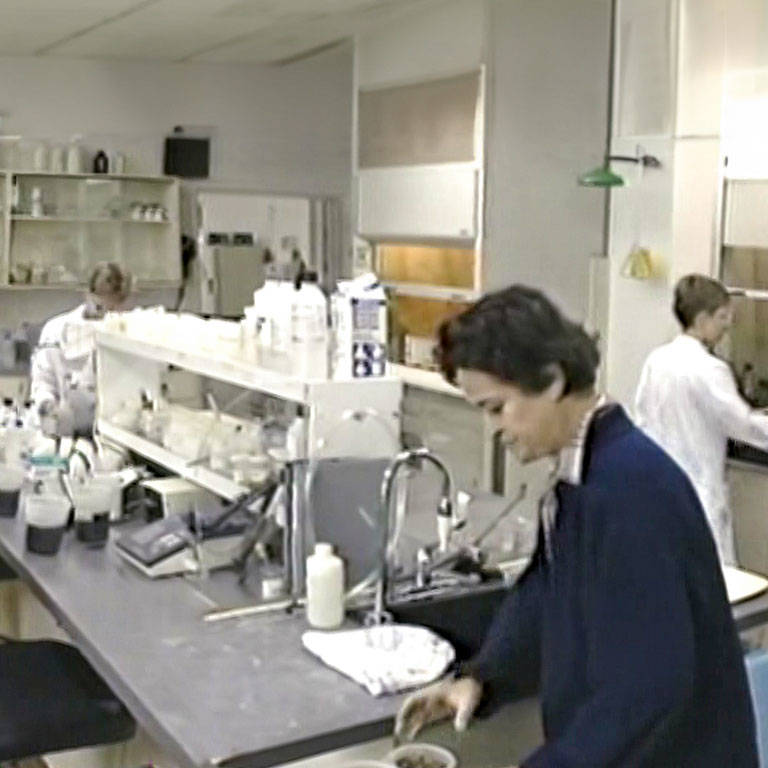 Team members in a lab in 1983