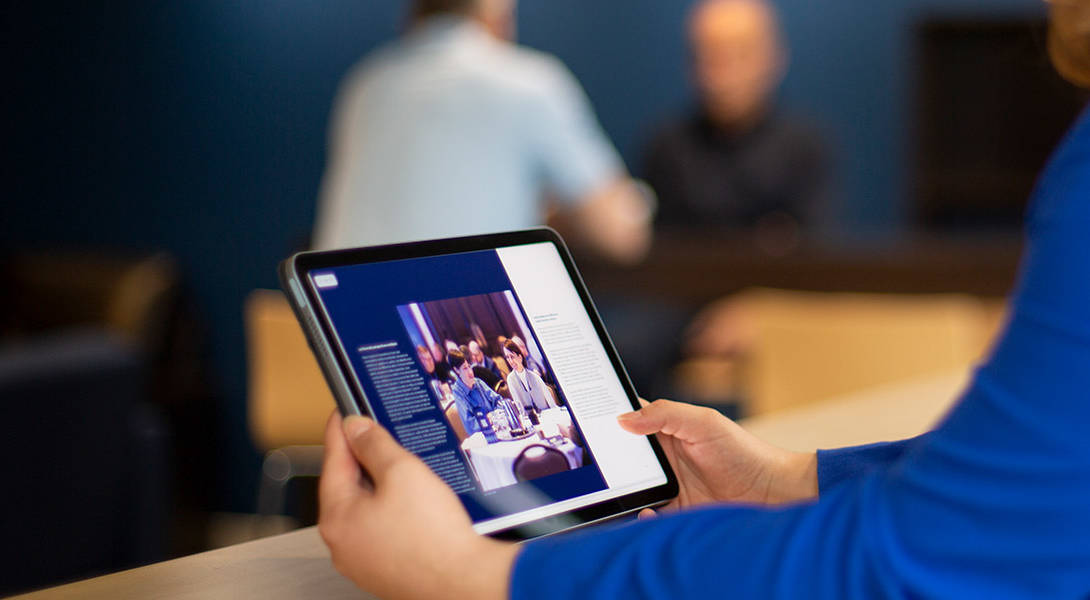 A person holding an ipad