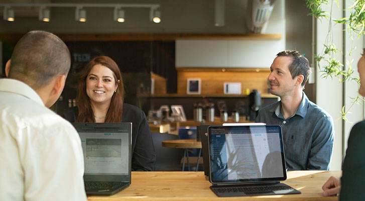 People talking at a coffee