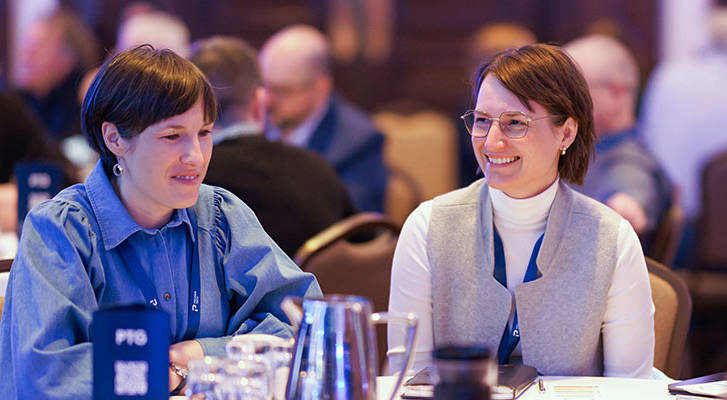 People seating at a table during an event