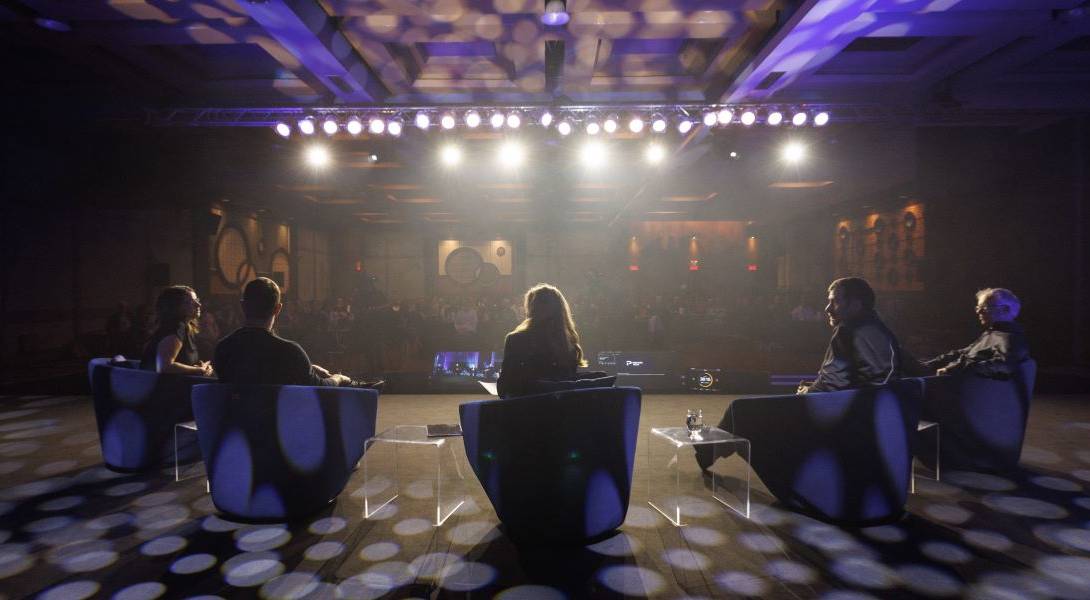 People onstage during the PT Summit.