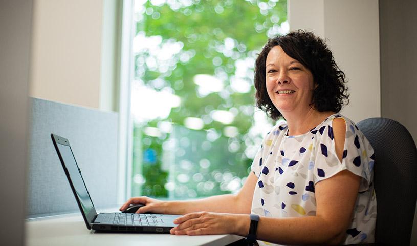 Team member working on a computer