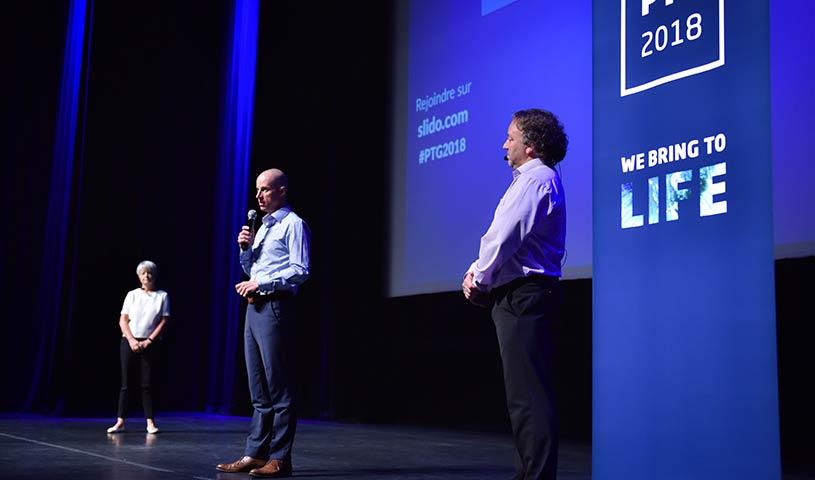 Team members doing a presentation