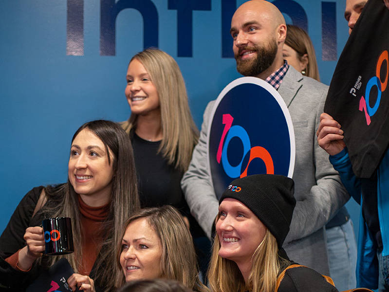 Team members smiling