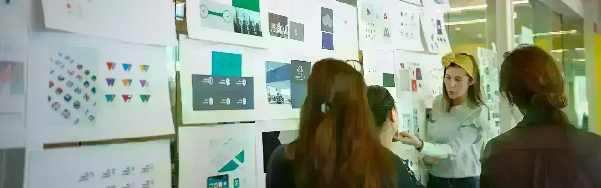 Team member pointing at charts